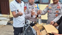 Polsek Langgudu Amankan Puluhan Botol Miras Tradisional Siap Edar